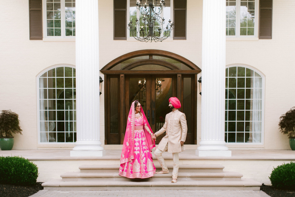 Amber and Sukhbir Walking Down Front Steps