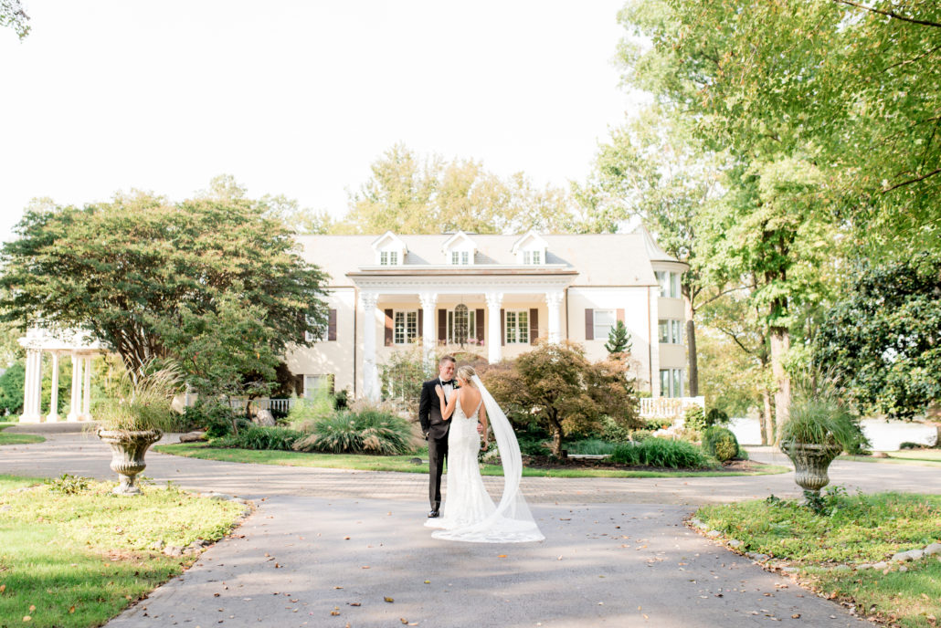 Classic Bride and Groom First Look in Front of Mansion at The Estate at Cherokee Dock | Tennessee Lakeside Wedding Venue
