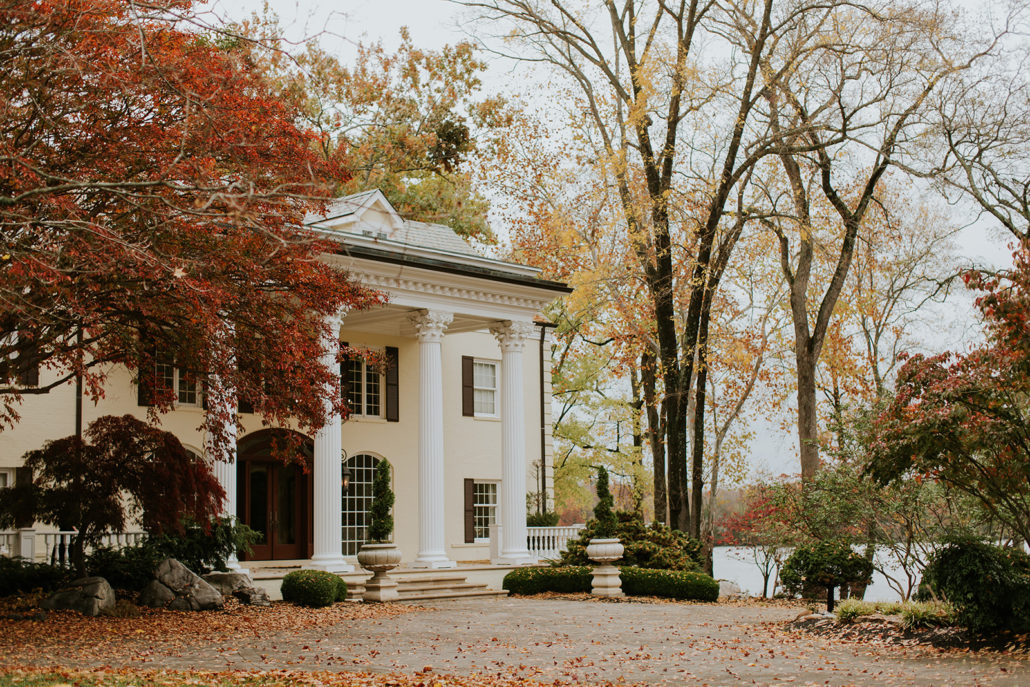 The mansion of luxury lakeside wedding venue during the fall