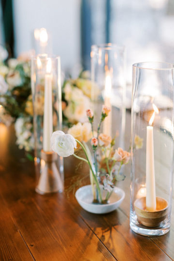 long stem candles and bud vases table decor