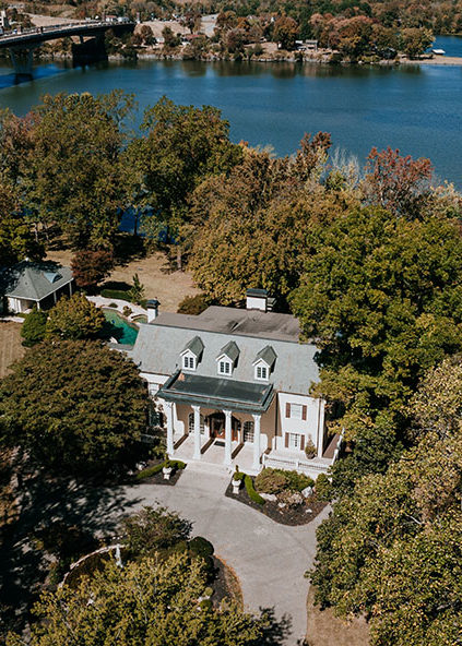 aerial shot of the mansion and lake at Cherokee Dock