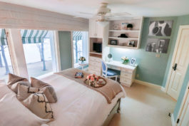 Dolly Partin themed bedroom with soft teal walls