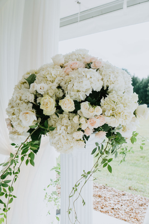 Classic Wedding Floral Arrangement with white hydrangeas and soft roses
