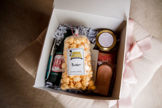 Wedding guest gift box with treats and butter popcorn