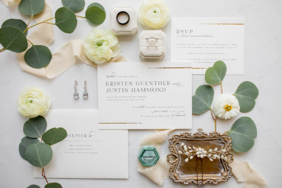 Elegant Black and Ivory Wedding Invitation Suite with Bridal Accessories and White Flowers