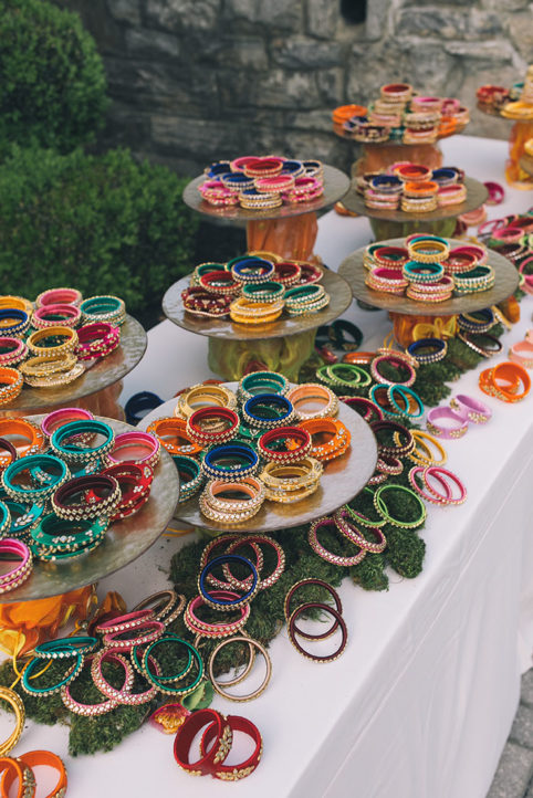 Table of colorful bangle bracelets for guests